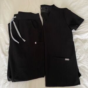 Figs Scrubs set in Black. Medium Tall Yola and Small Casma.